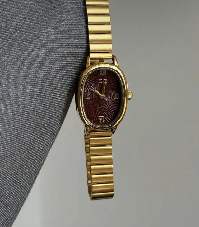 Gold Roman Oval Watch with Burgundy Dial