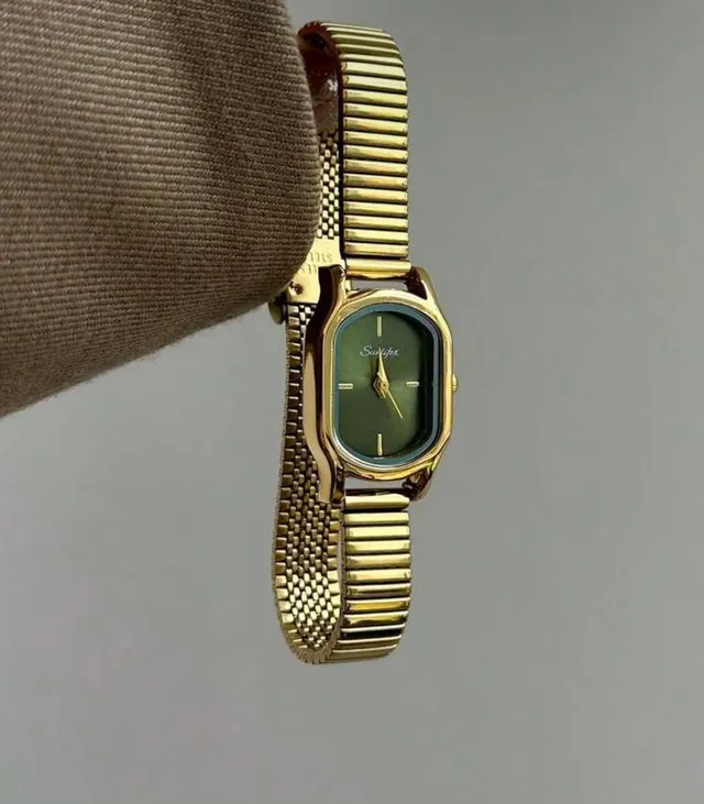 Gold Watch with Emerald Dial